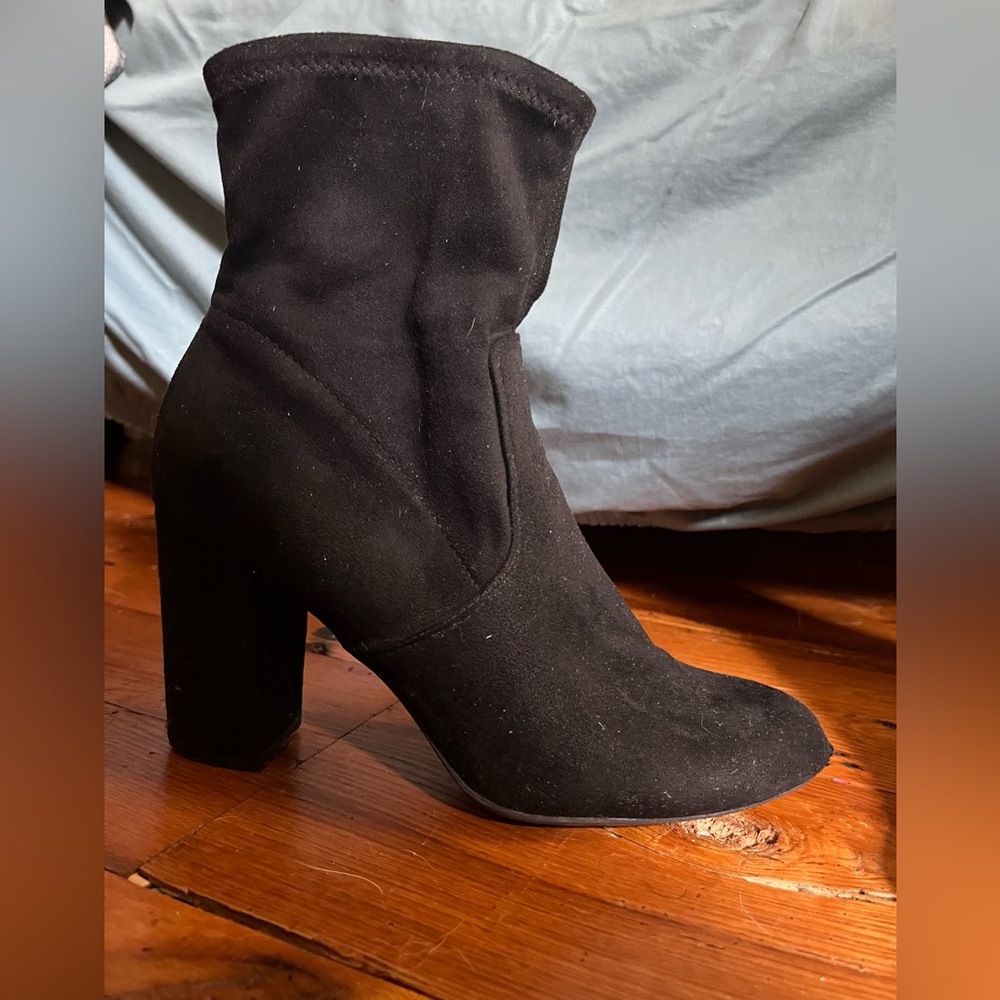Slouchy, black suede boot. Lightly worn. Still in very good condition.